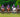 The Mirror Polo Team — all four players wearing Jason Brickhill Holographic Mosaic purple polo jerseys numbers 1, 2, 3 and 4 on horseback at Cirencester Polo Club