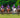 The Mirror Polo Team — all four players wearing Jason Brickhill Holographic Mosaic purple polo jerseys numbers 1, 2, 3 and 4 on horseback at Cirencester Polo Club