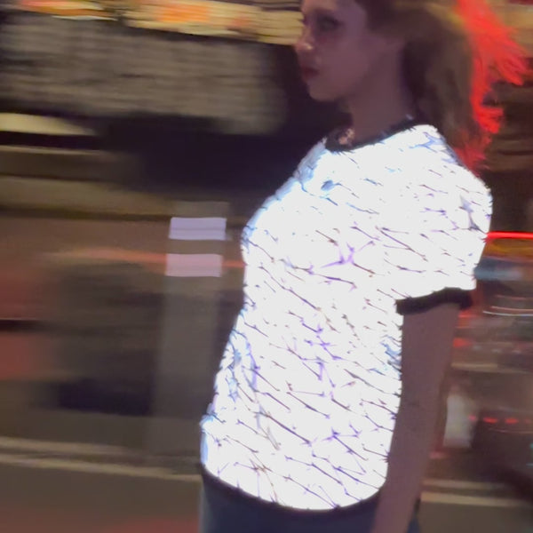 skateboarding in reflective tshirt